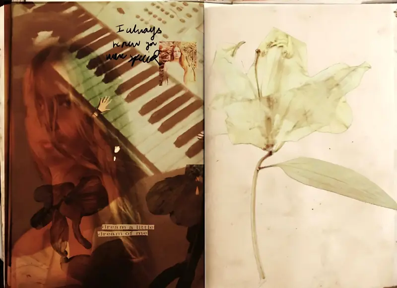 Sketchbook spread: a sepia photograph of hands at a piano with handwritten text, beside a pressed lily.